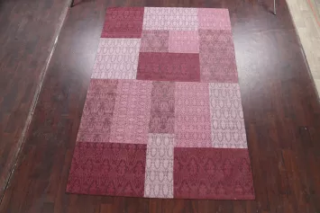 Elegant Patchwork Rug in Chic Pink and Burgundy Hues