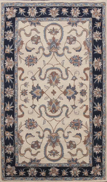 Hand-tufted Ivory/Navy Agra Area Rug 5x8