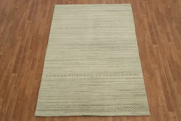 Chic neutral-toned Gabbeh Ivory Rug perfect for modern decor styles 4x6