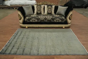 Muted Elegance: Subtle Green and Gray Floral Patterned Rug 5x8