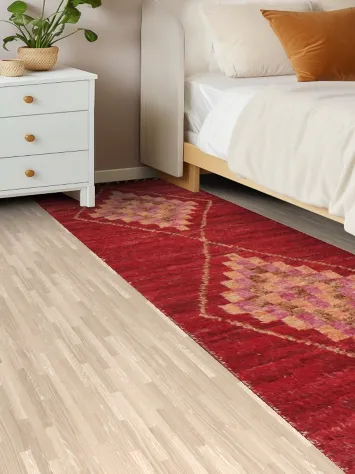 Colorful Handwoven Rug with Intricate Red and Pink Motifs 3x11