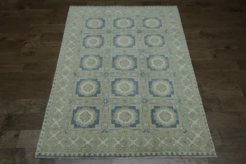 Muted beige, blue, and green tone Khotan Geometric Area Rug 5x7