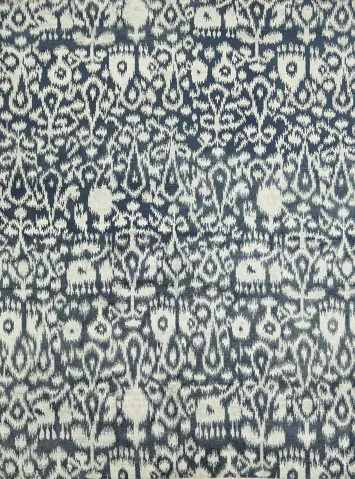 Elegant Navy and Ivory Ikat Patterned Rug for Living Spaces
