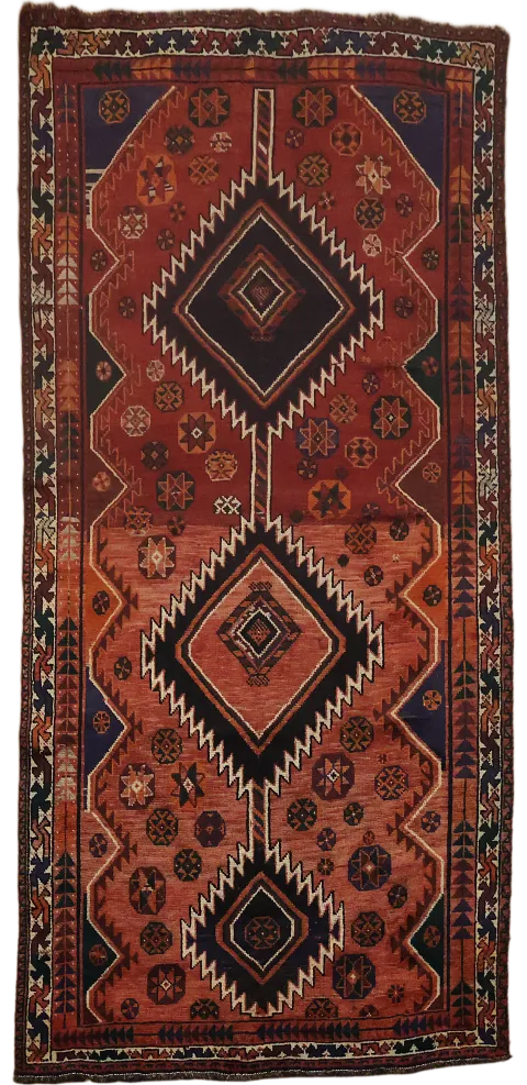 Warm Toned Handwoven Rug Featuring Unique Tribal Motifs 5x10