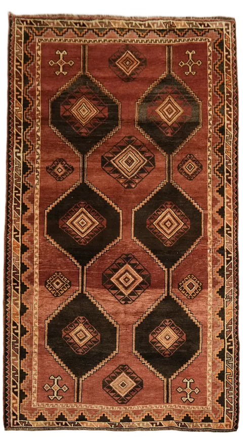 Warm Tones and Geometric Charm in Vintage Tribal Rug 5'x9'