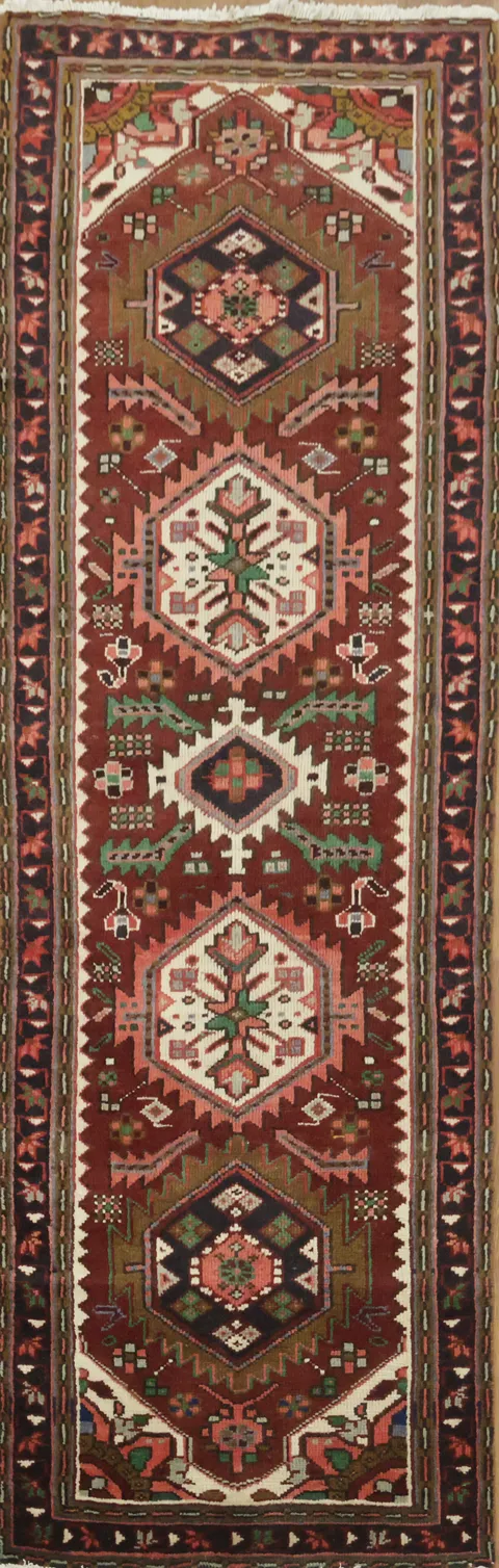 Timeless Red and Green Tribal Rug with Traditional Motifs
