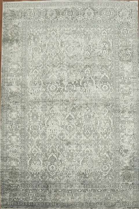 Soft Gray Rug with Detailed Ornamental Motifs