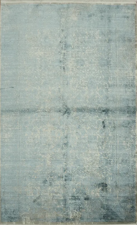 Elevate Your Space with This Chic Blue Distressed Rug 5x8