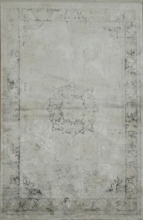 Elegant Vintage Distressed Rug in Soft Neutral Tones
