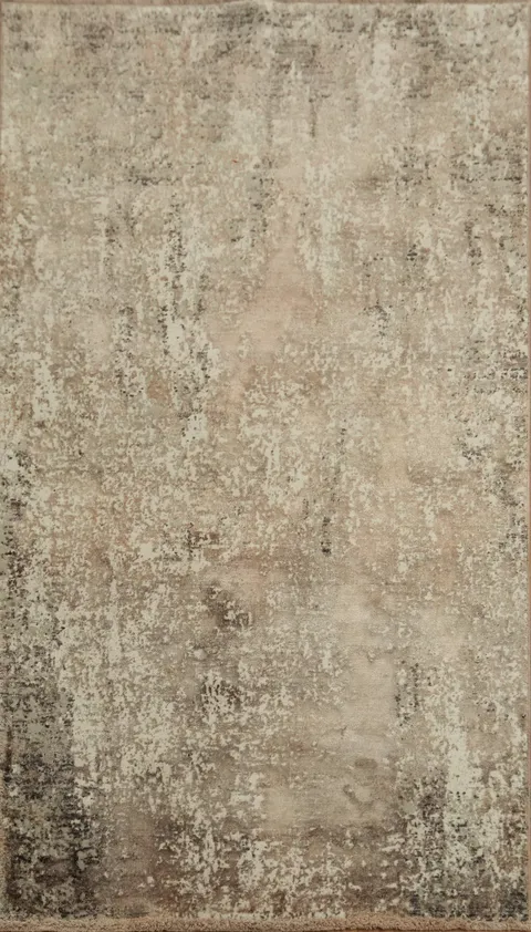 Add classic charm with this textured neutral area rug