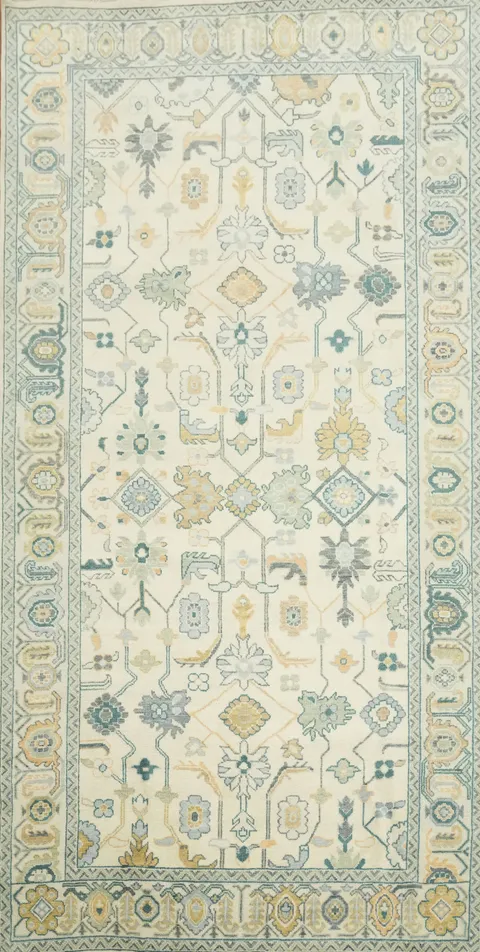 8'x16' Large Classic Ivory Rug with Intricate Pattern and Soft Blue Hues