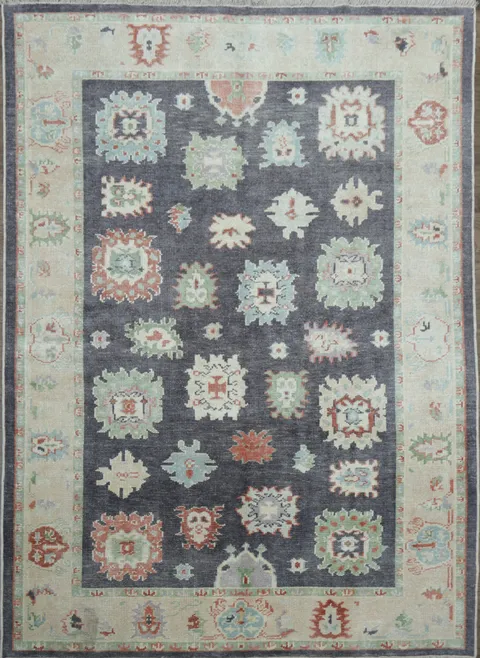 Muted Navy Blue Oushak Turkish Wool Rug with Vibrant Floral Patterns and Border 6x9