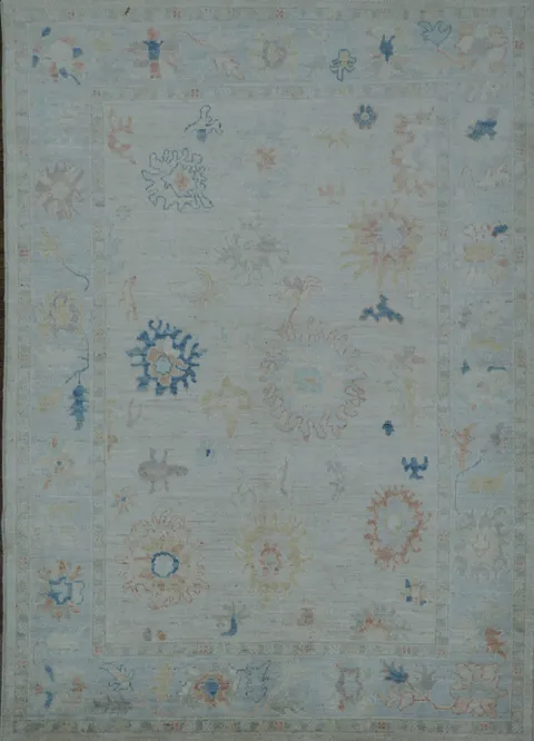 Muted Beige and Pastel Blue Turkish Rug Featuring Delicate, Artistic Patterns 5x7